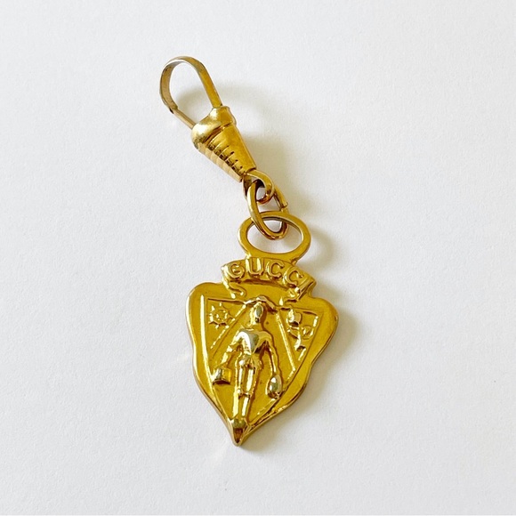 Gucci Accessories - Gucci vintage gold shield crest charm